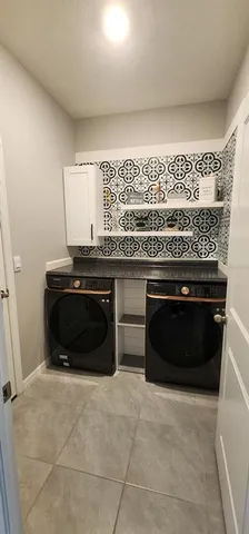 a kitchen with a stove and a sink