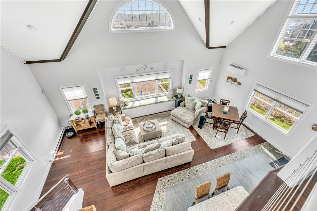 32 Breach Drive Westerly, RI 02891 - Photo 12 of 43 The dramatic two story living and dining area!