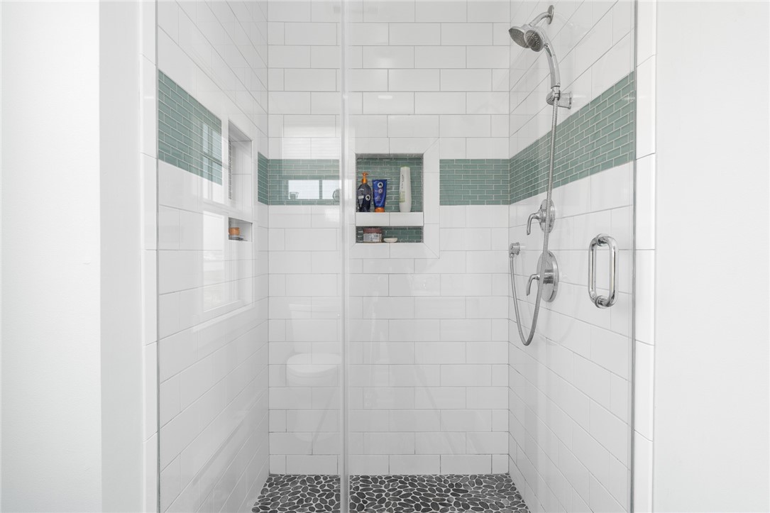 32 Breach Drive Westerly, RI 02891 - Photo 22 of 43 The main bath features a stylishly tiled shower.