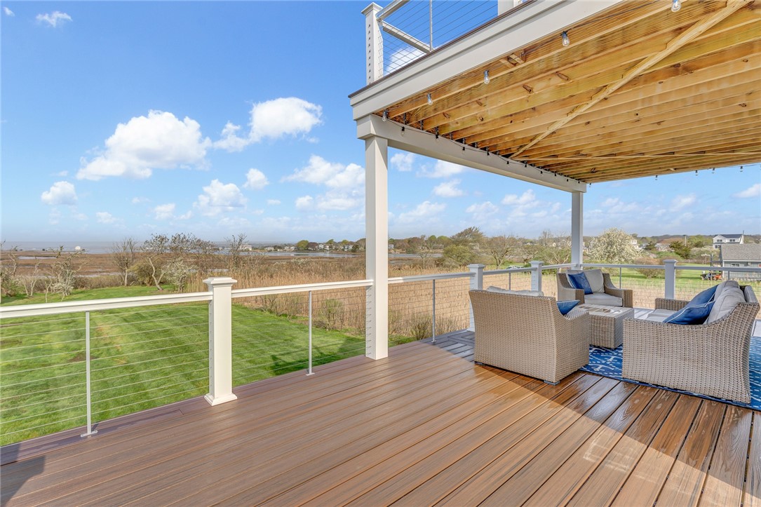 32 Breach Drive Westerly, RI 02891 - Photo 30 of 43 Outdoor decks add over 1,600 sq. ft. of outdoor space.