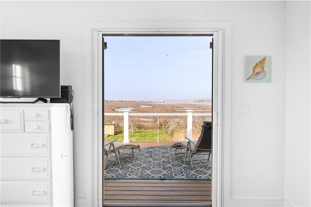 32 Breach Drive Westerly, RI 02891 - Photo 35 of 43 The main bedroom deck has sweeping views.