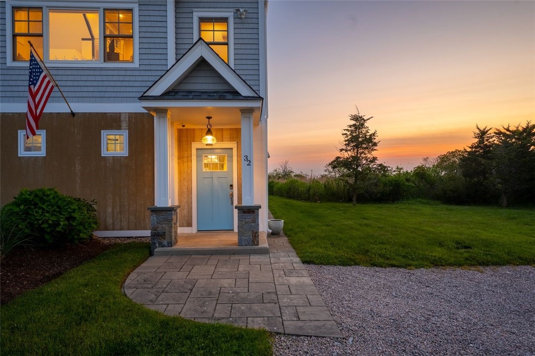 32 Breach Drive Westerly, RI 02891 - Photo 7 of 43 This pretty blue door is a welcoming entrance to your quintessential beach house.