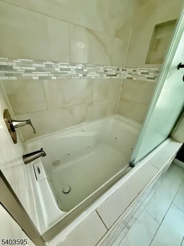 a bathroom with a bathtub