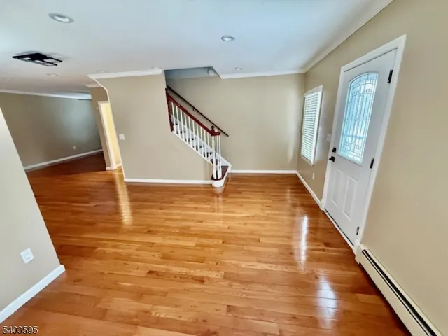 a view of a hallway with staircase