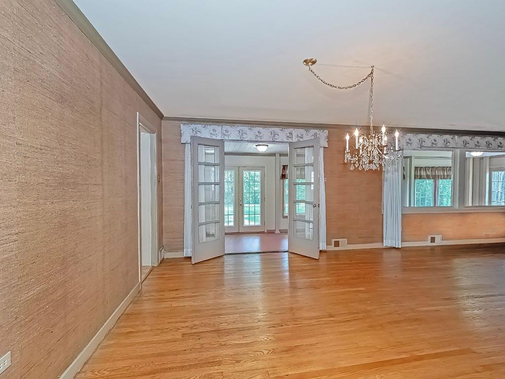2848 Brodhead Road Aliquippa, PA 15001 - Photo 12 of 33 a view of empty room with wooden floor and fan