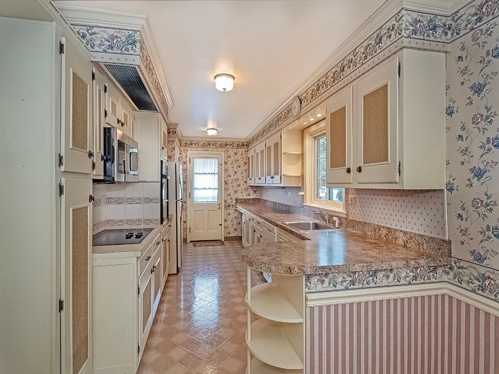 2848 Brodhead Road Aliquippa, PA 15001 - Photo 19 of 33 a kitchen with stainless steel appliances granite countertop a sink stove and refrigerator