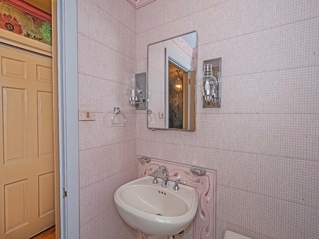 2848 Brodhead Road Aliquippa, PA 15001 - Photo 31 of 33 a bathroom with a sink and a mirror