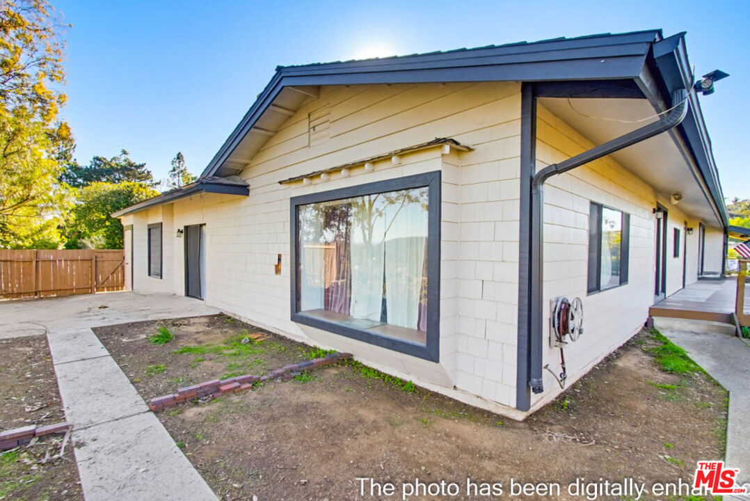 3709 Buena Creek Road Vista, CA 92084 - Photo 35 of 62 a view of entrance door of a house