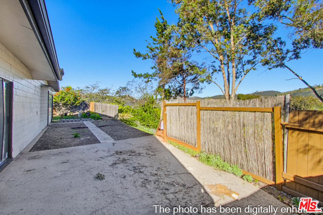 3709 Buena Creek Road Vista, CA 92084 - Photo 38 of 62 a view of a backyard with pathway