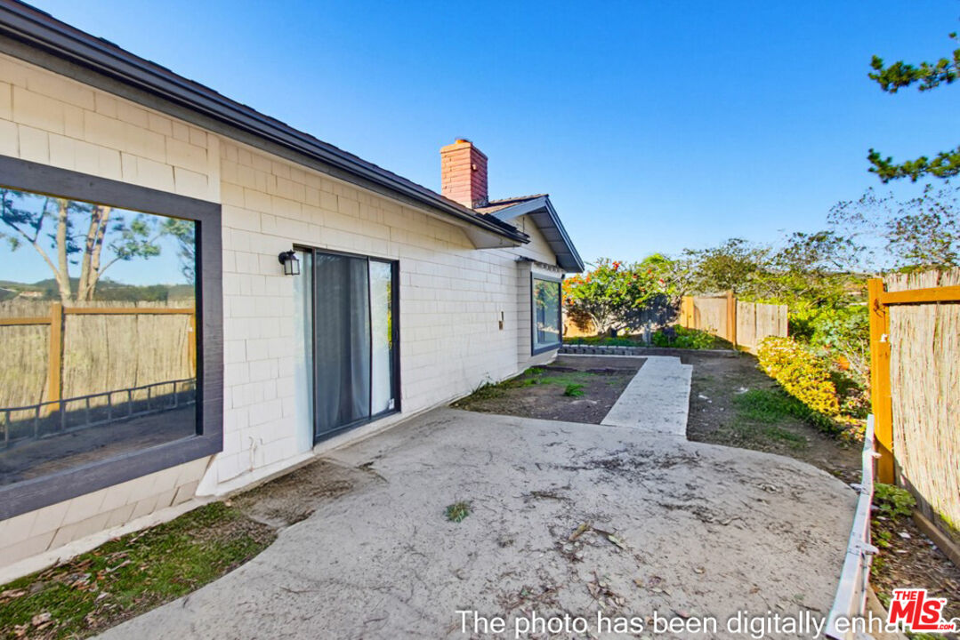 3709 Buena Creek Road Vista, CA 92084 - Photo 39 of 62 a front view of a house with a yard