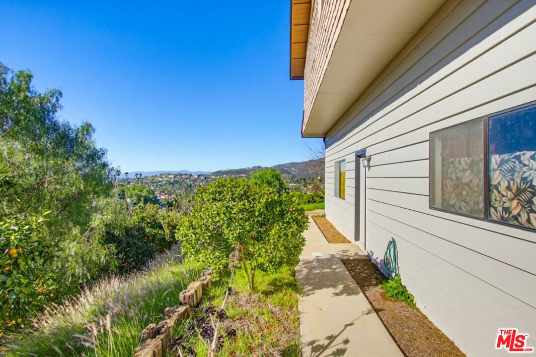 3709 Buena Creek Road Vista, CA 92084 - Photo 43 of 62 a view of a back yard of the house