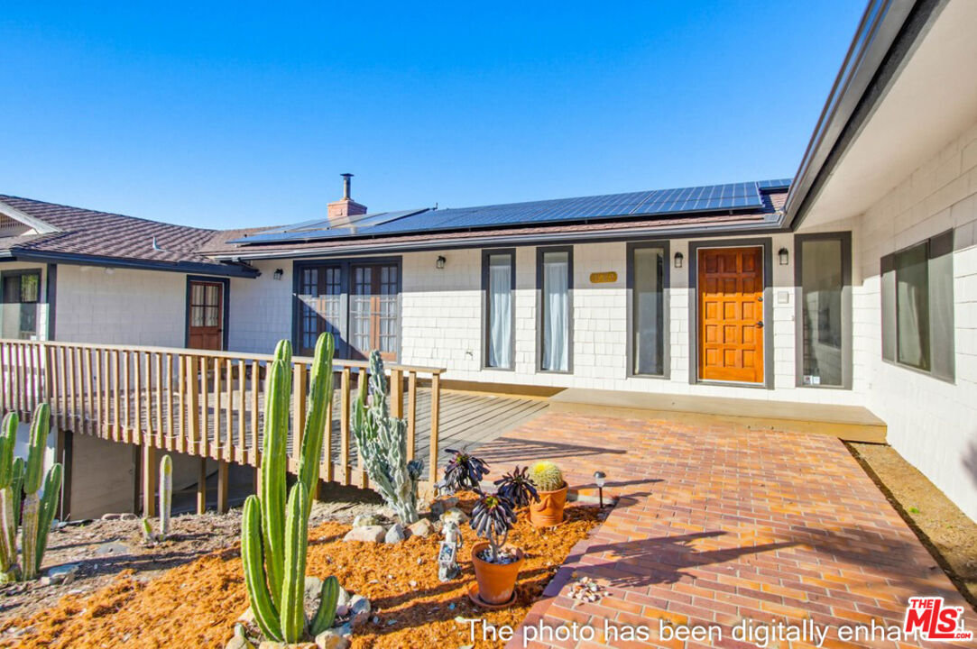 3709 Buena Creek Road Vista, CA 92084 - Photo 5 of 62 a view of a house with wooden floor and a yard