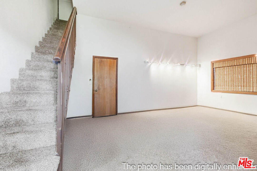 3709 Buena Creek Road Vista, CA 92084 - Photo 54 of 62 a view of an empty room with stairs