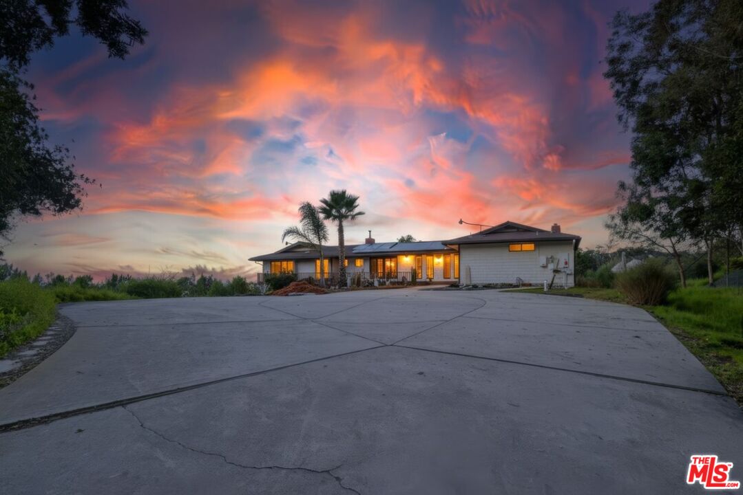 3709 Buena Creek Road Vista, CA 92084 - Photo 59 of 62 a view of a house with a yard