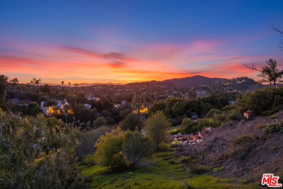 3709 Buena Creek Road Vista, CA 92084 - Photo 61 of 62 a view of a city with mountains in the background