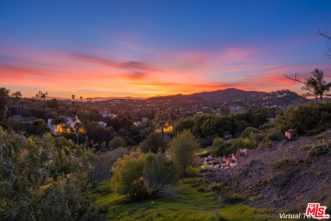 3709 Buena Creek Road Vista, CA 92084 - Photo 62 of 62 a view of a city with mountains in the background