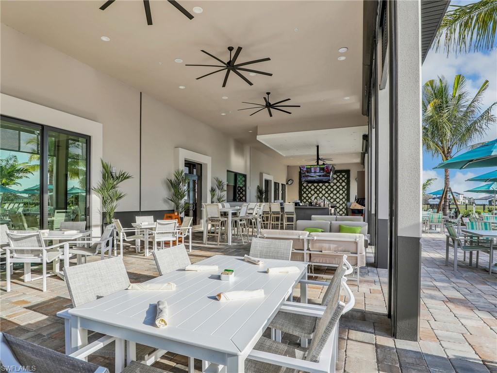 18412 Ridgeline Drive Estero, FL 33928 - Photo 50 of 50 a view of a dining room with furniture window and outside view