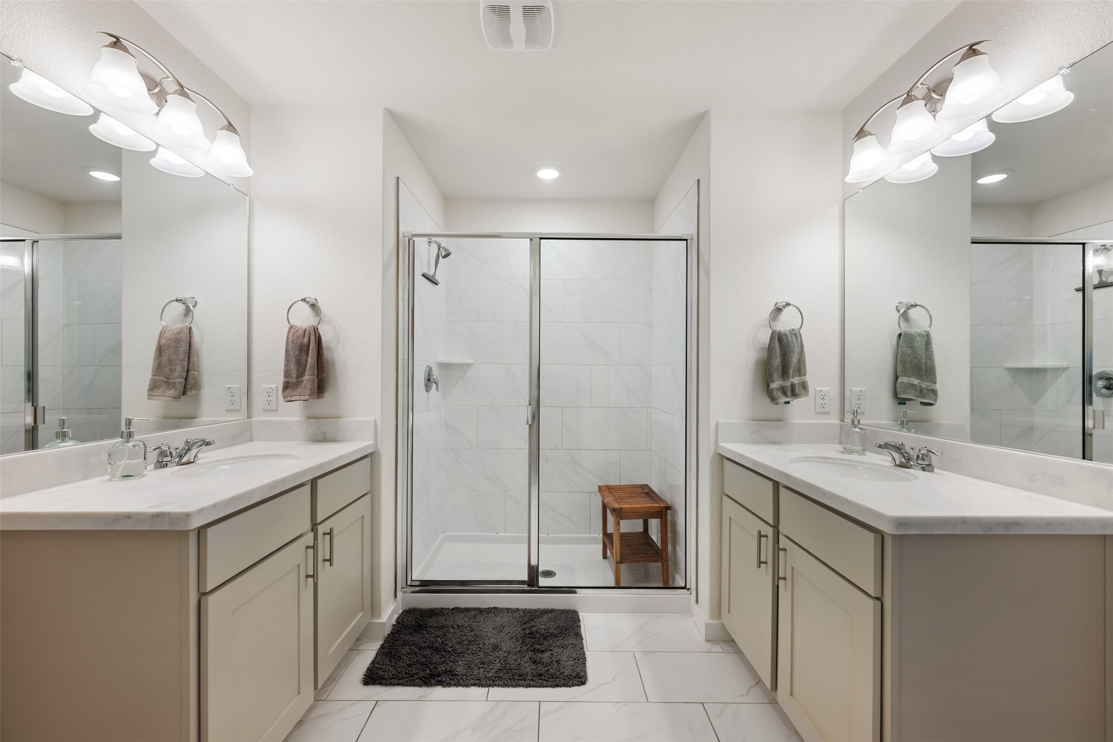 8204 Prairie Rye Drive Lago Vista, TX 78645 - Photo 18 of 39 Double vanities, spacious walk-in shower.