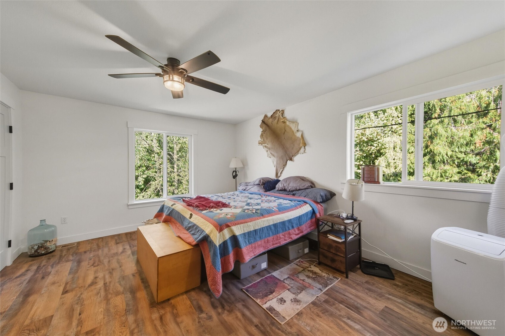 4955 South Pass Road Sumas, WA 98295 - Photo 16 of 40 a bedroom with a bed and a window