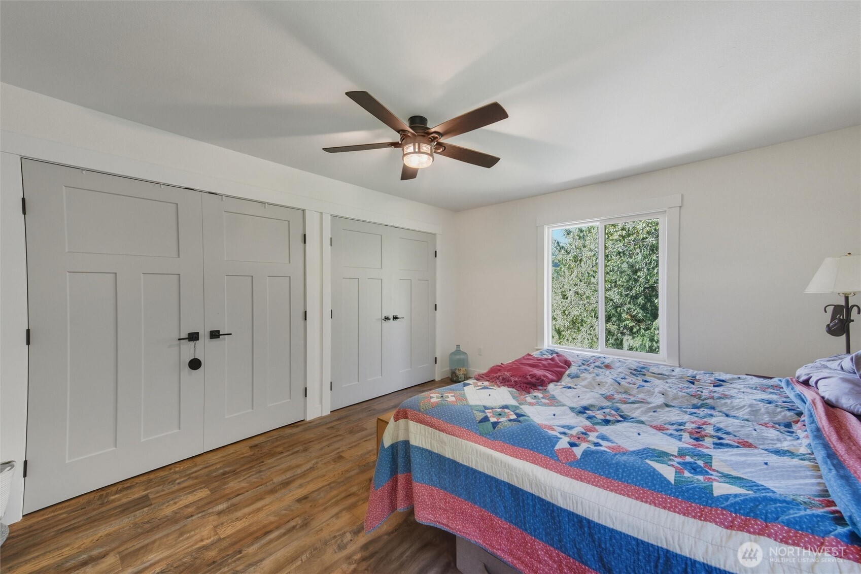 4955 South Pass Road Sumas, WA 98295 - Photo 18 of 40 a bedroom with a bed and a window