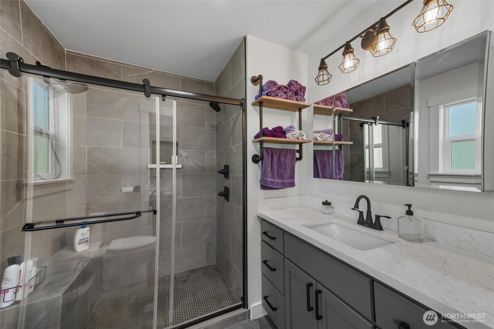 4955 South Pass Road Sumas, WA 98295 - Photo 19 of 40 a bathroom with a granite countertop shower sink vanity and mirror