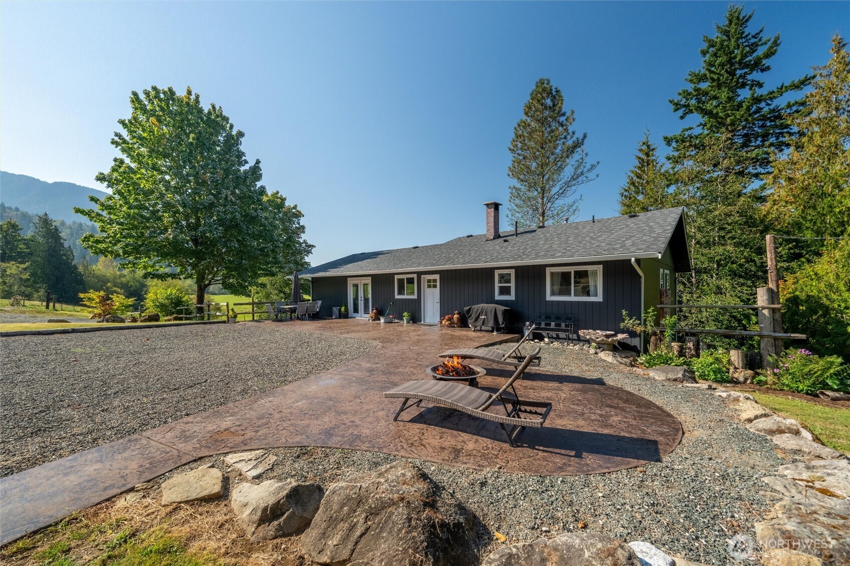 4955 South Pass Road Sumas, WA 98295 - Photo 35 of 40 a view of a house with backyard and sitting area