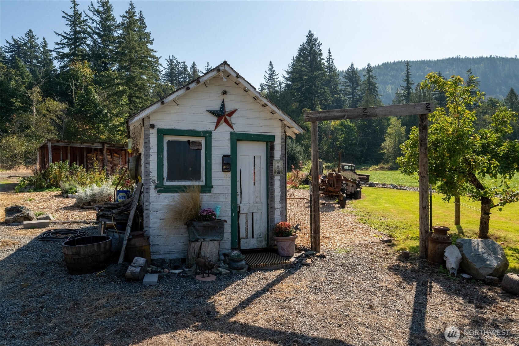 4955 South Pass Road Sumas, WA 98295 - Photo 38 of 40 a view of a house with backyard tub and sitting area