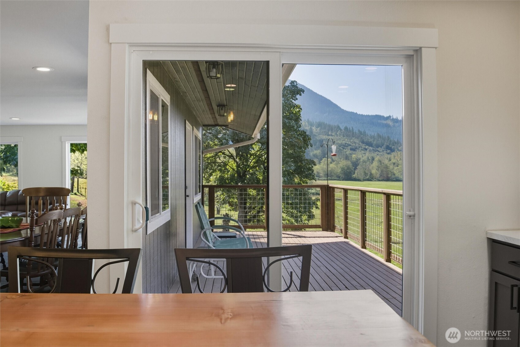 4955 South Pass Road Sumas, WA 98295 - Photo 8 of 40 a living room with large window and a couch