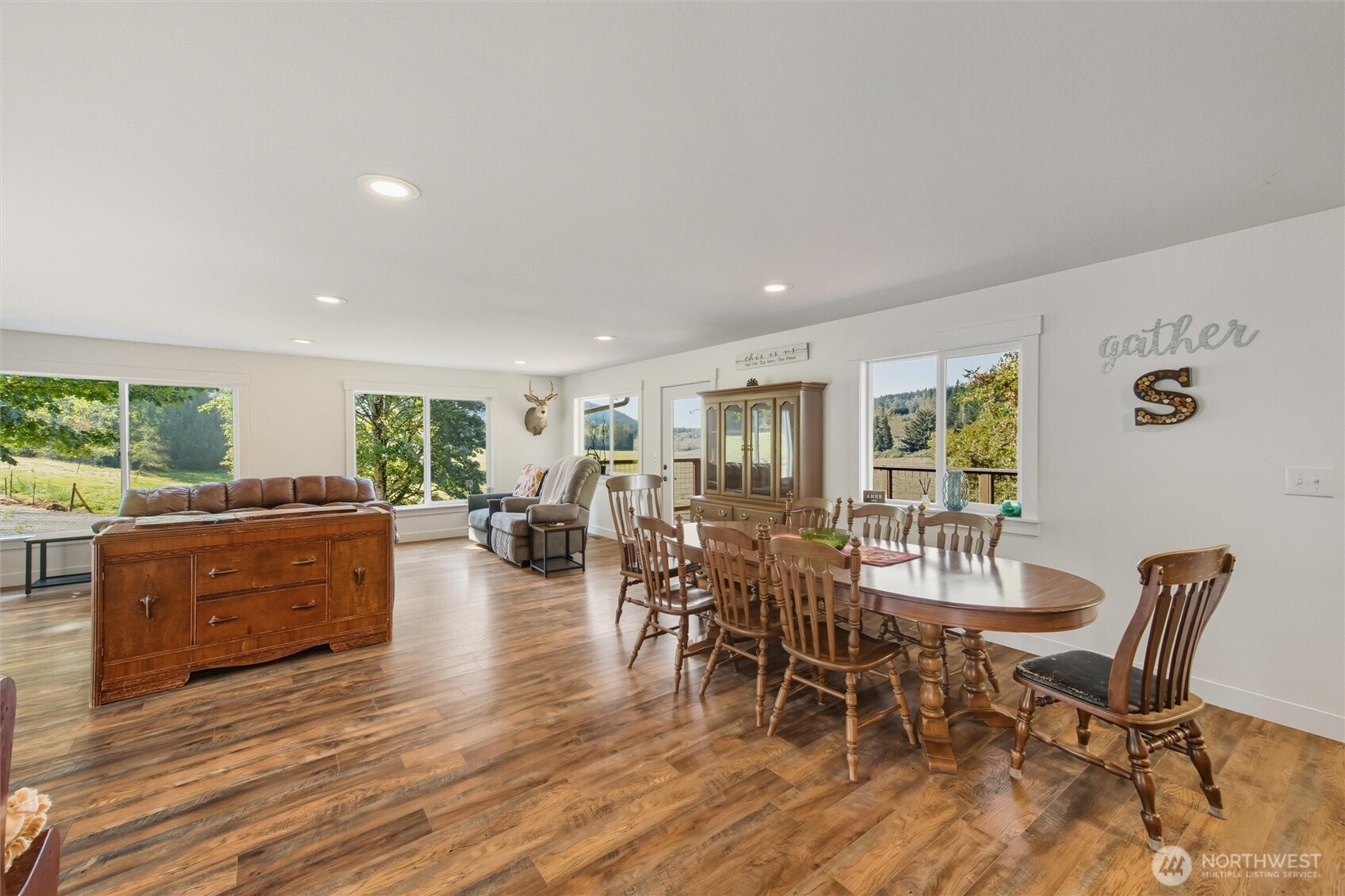 4955 South Pass Road Sumas, WA 98295 - Photo 9 of 40 a view of a dining room with furniture window and wooden floor