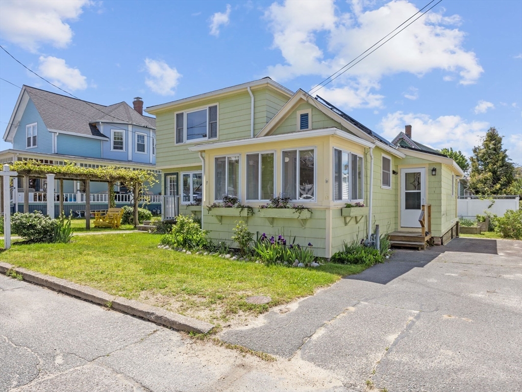 7 Grove Street Wareham, MA 02558 - Photo 2 of 41 a front view of a house with a yard