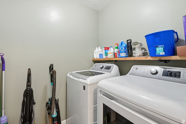 1175 Silver Hollow Road Syracuse, UT 84075 - Photo 26 of 34 Dedicated laundry area featuring a full-size washer and dryer