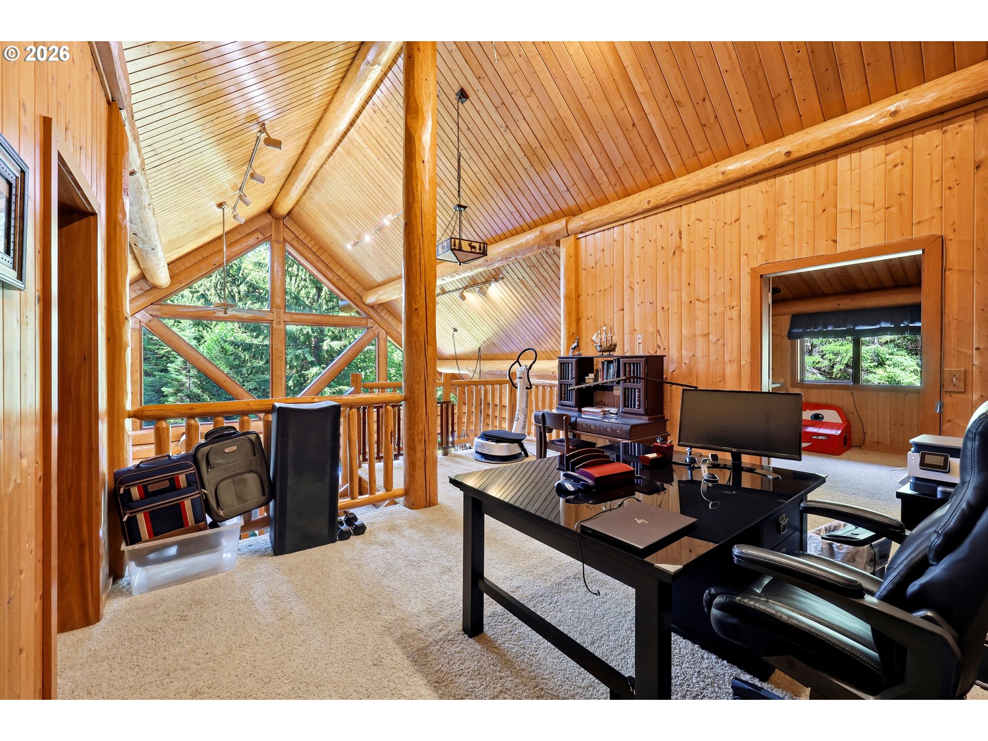 390 Spruce Creek Road Longview, WA 98632 - Photo 30 of 45 a view of a workspace with furniture and a window