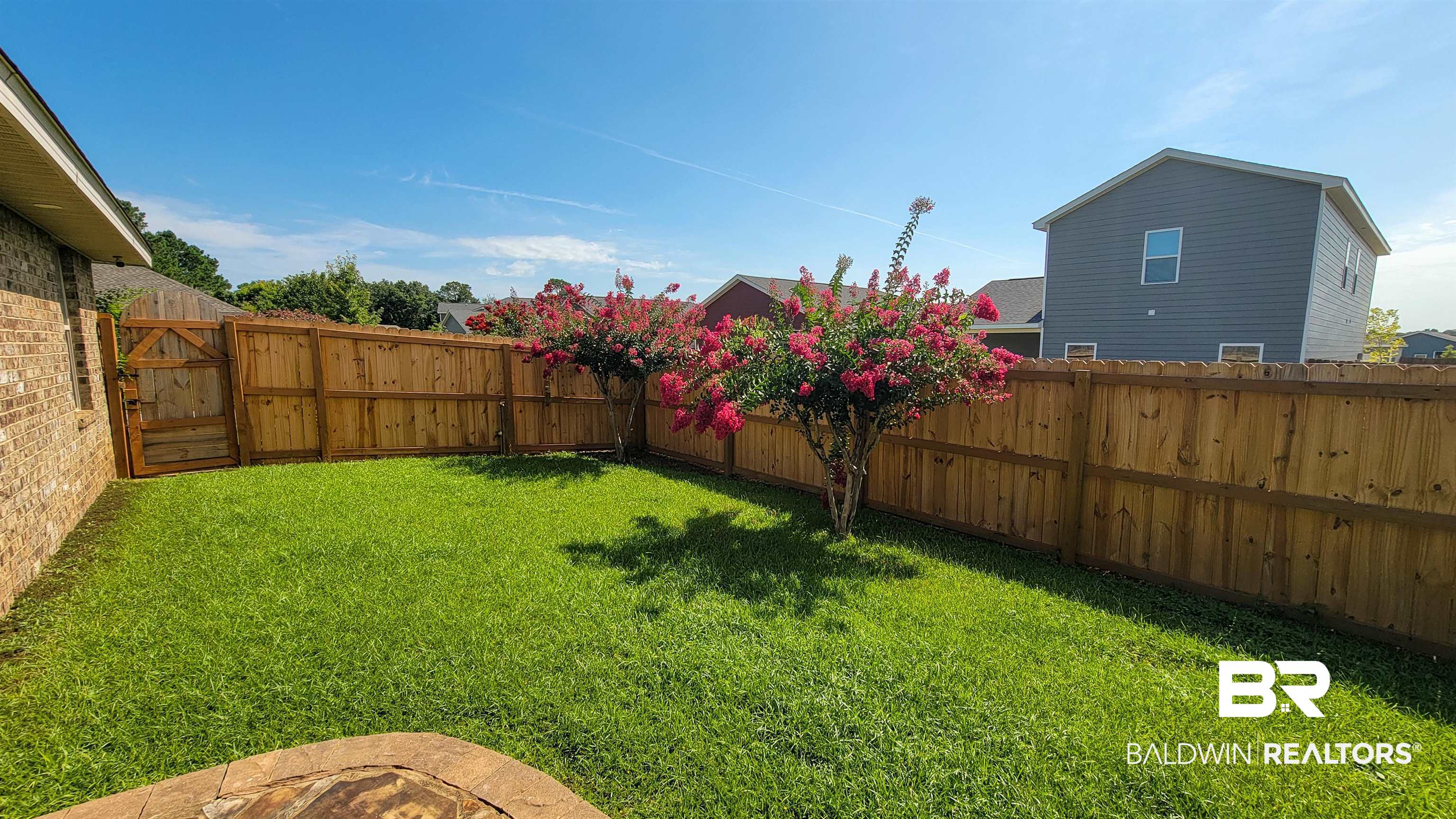 1704 Arcadia Drive Foley, AL 36535 - Photo 36 of 52 Fenced backyard with a gate