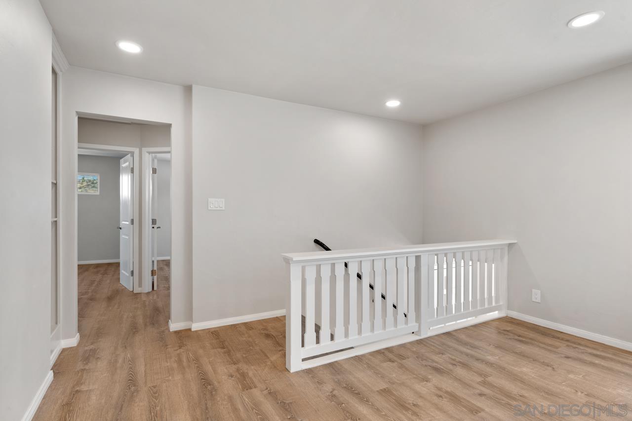 3276 Main Street Lemon Grove, CA 91945 - Photo 11 of 75 a view of a hallway with wooden floor