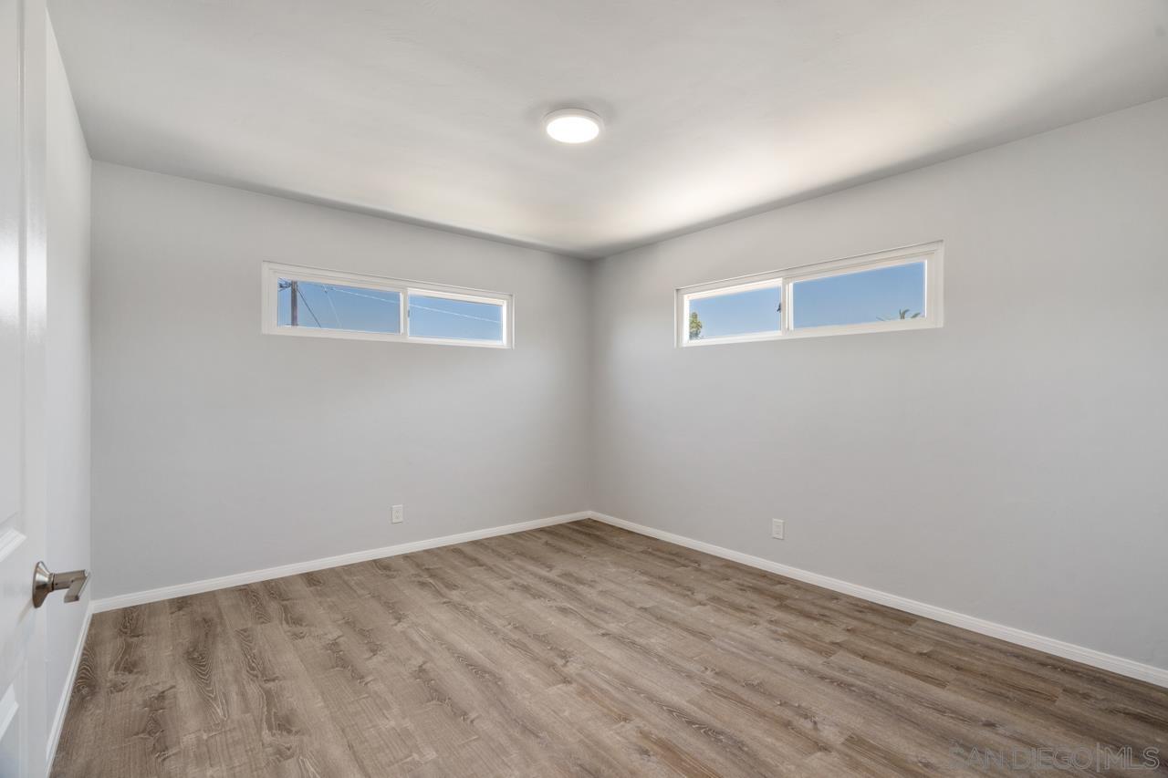 3276 Main Street Lemon Grove, CA 91945 - Photo 18 of 75 a view of a room with wooden floor and white walls