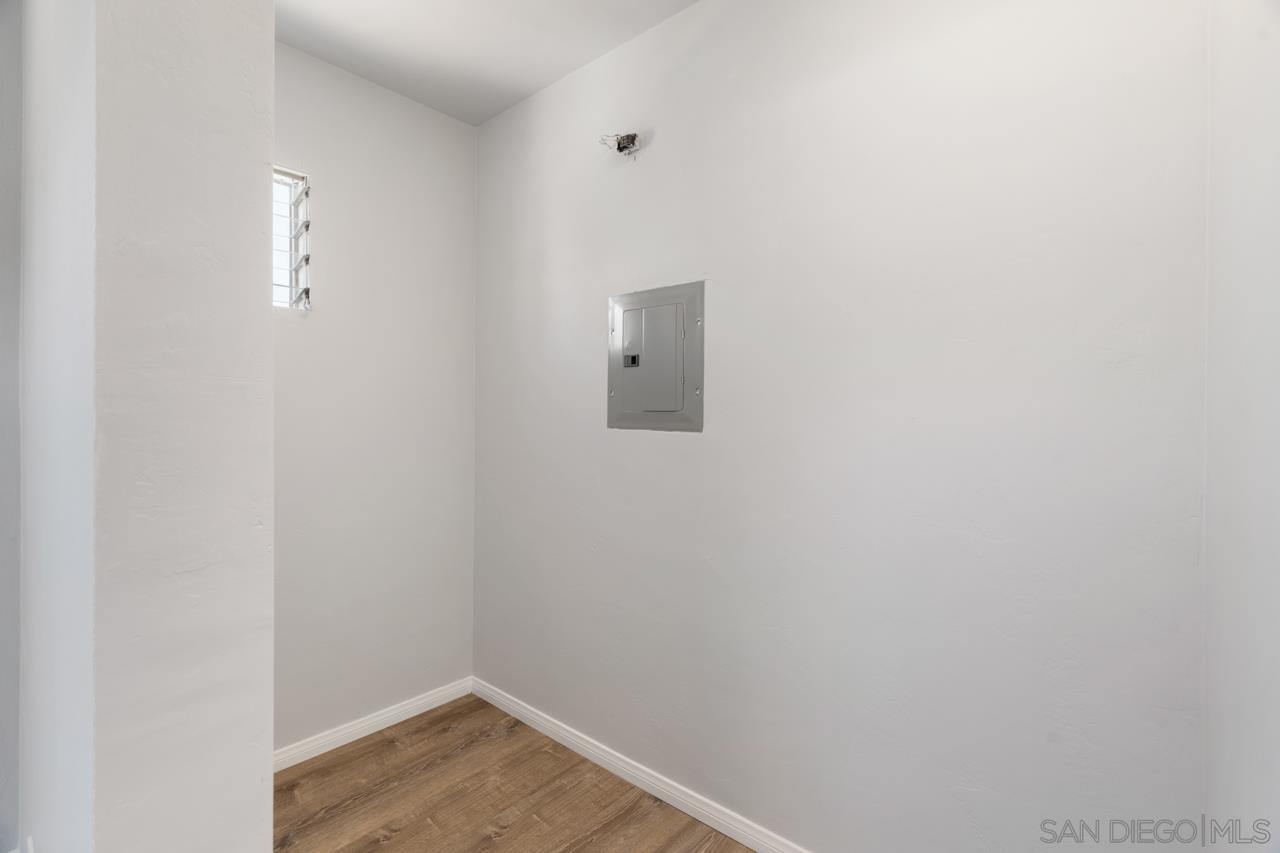 3276 Main Street Lemon Grove, CA 91945 - Photo 25 of 75 a view of a small space with wooden floor and a window