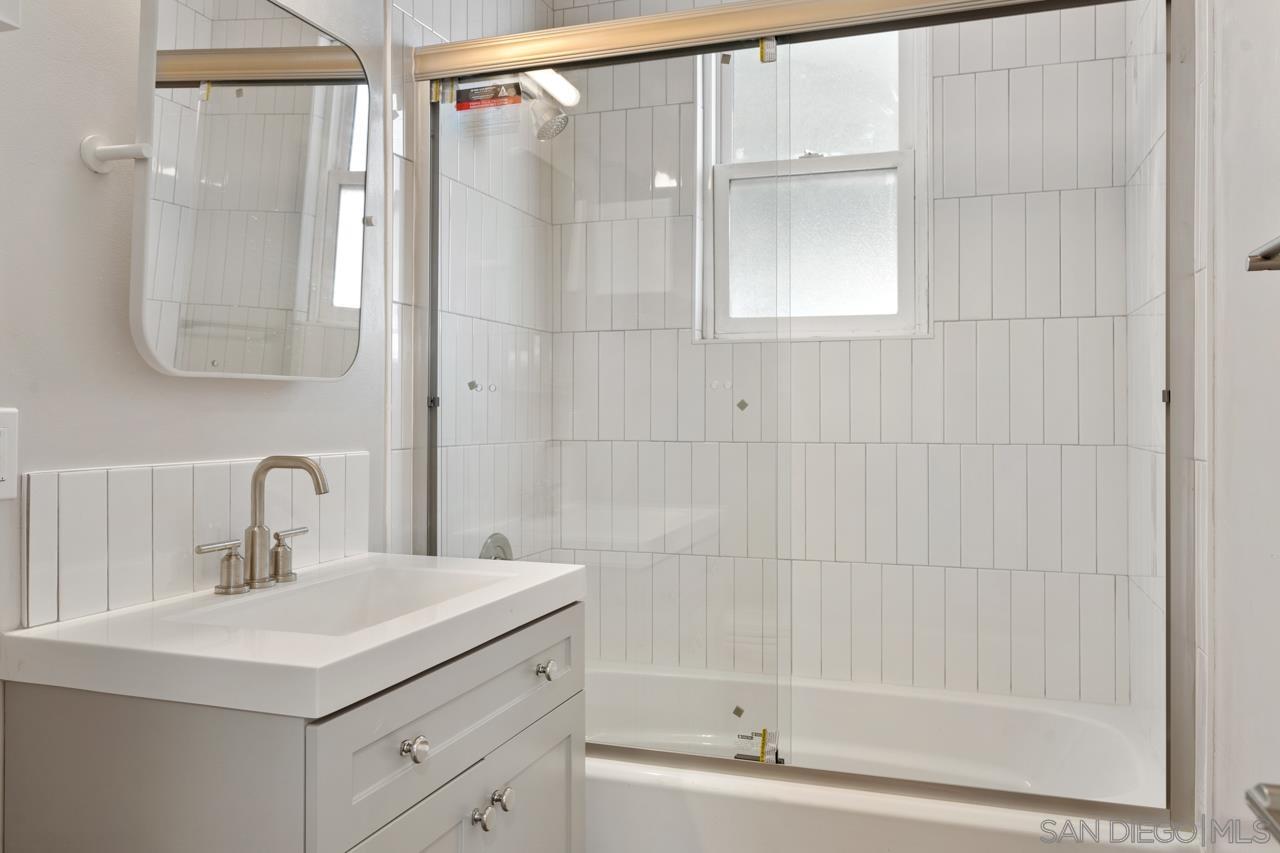 3276 Main Street Lemon Grove, CA 91945 - Photo 27 of 75 a bathroom with a sink vanity tub and shower