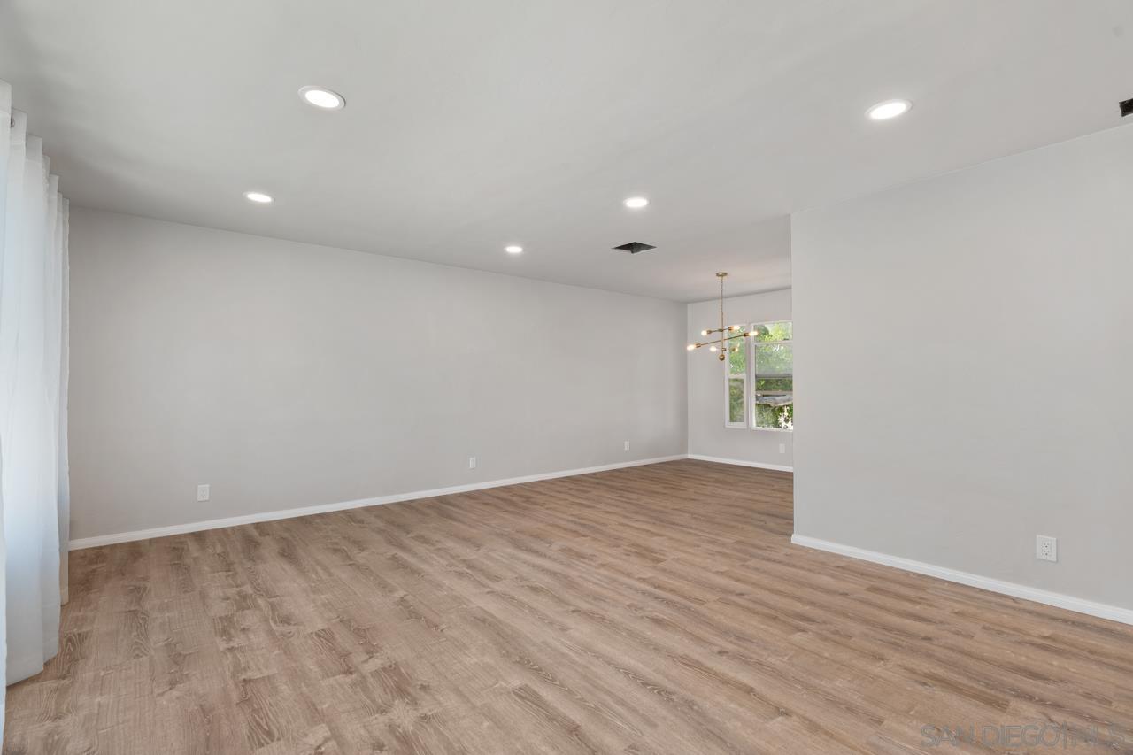 3276 Main Street Lemon Grove, CA 91945 - Photo 10 of 75 an empty room with wooden floor and windows