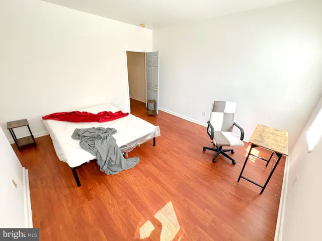 a bathroom with a sink toilet and mirror