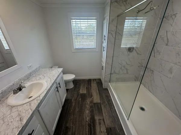 a view of a room with racks on the wall