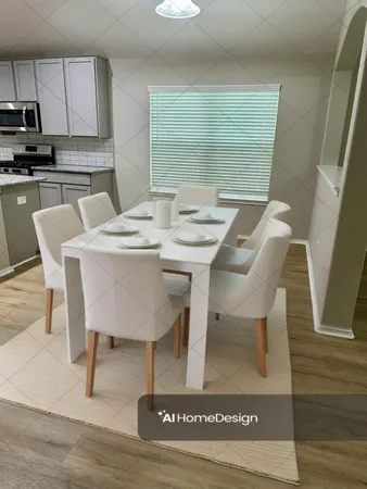 a view of kitchen with cabinets and wooden floor