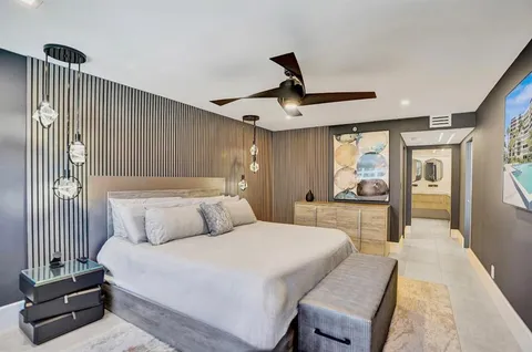 a view of a white vase with white flowers