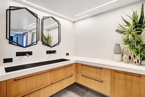 a bathroom with a shower and a shower