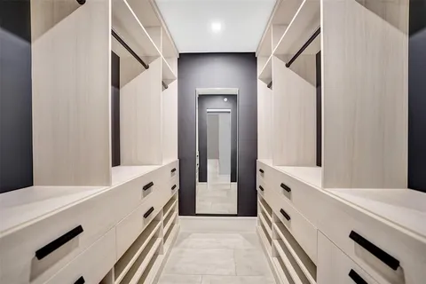 a bedroom with a bed and furniture