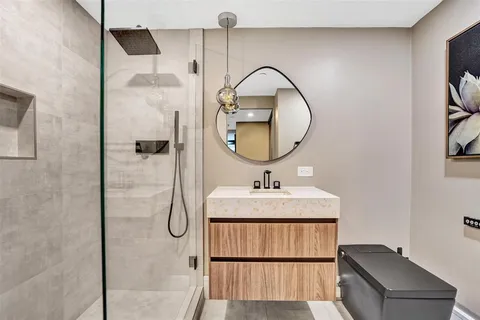 a living room with a couch and a flat screen tv