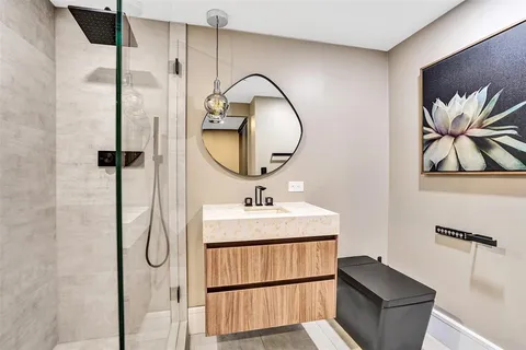 a utility room with washing machine and dryer