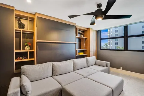 a view of a balcony with chairs