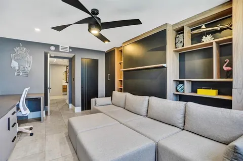 a room with gym equipment and mirror