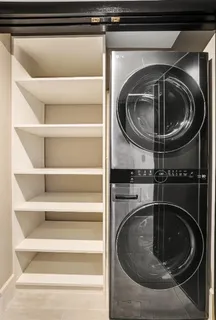 a room with gym equipment and window