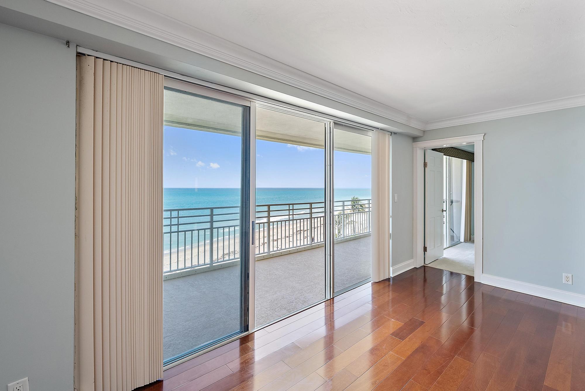 350 South Beach Road, Unit 503 Tequesta, FL 33469 - Photo 12 of 51 wooden floor in an empty room with a window